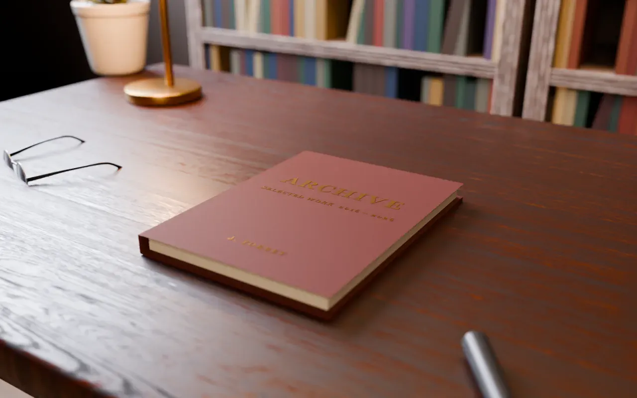 Linen book titled Archive on a reading table